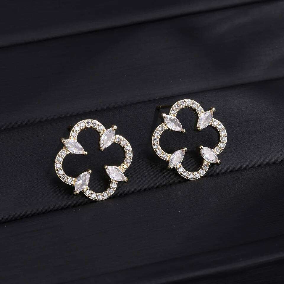 ZAKOL High-End Luxury Zircon Hollowed out Four-Leaf Flower Stud Earrings for Women Elegant Party Jewelry Gift Accessory