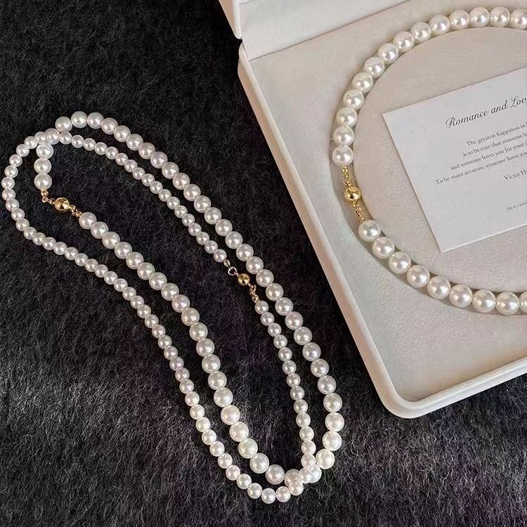 Luxury Brand Designer Jewelry New French Style Pearl Necklace Autumn Winter Magnetic Clasp Sweater Chain Light Luxury Elegant Neck Chain High-End Clav
