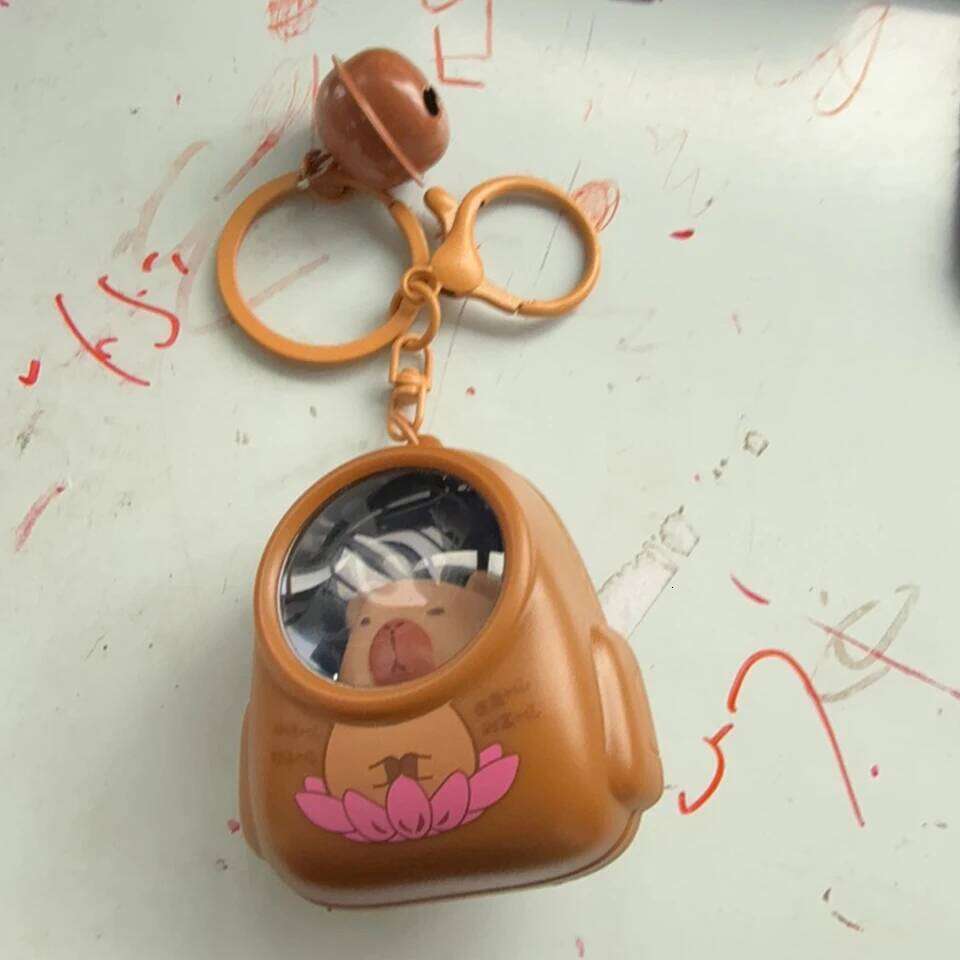 ZAKOL Creative Kapibala Luminous Keychain Cute Cartoon Space Capsule Capybara Keyring Bag Pendant Trinket Accessories Gift