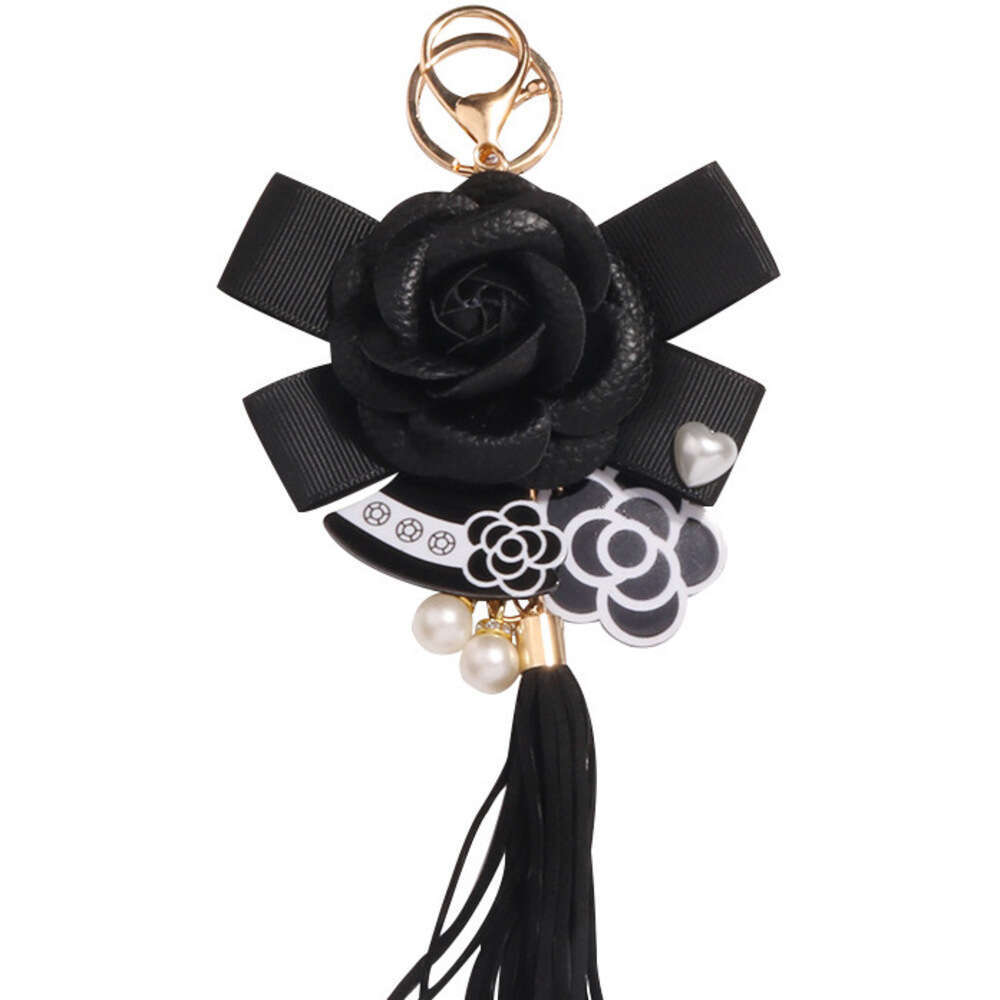 Women's Keychain Ornament Hanging Chain metal Hot Sale New Accessories Pearl Bow Pendant Jewelry Earphone Case Leather Flower Car Key Ring Phone 