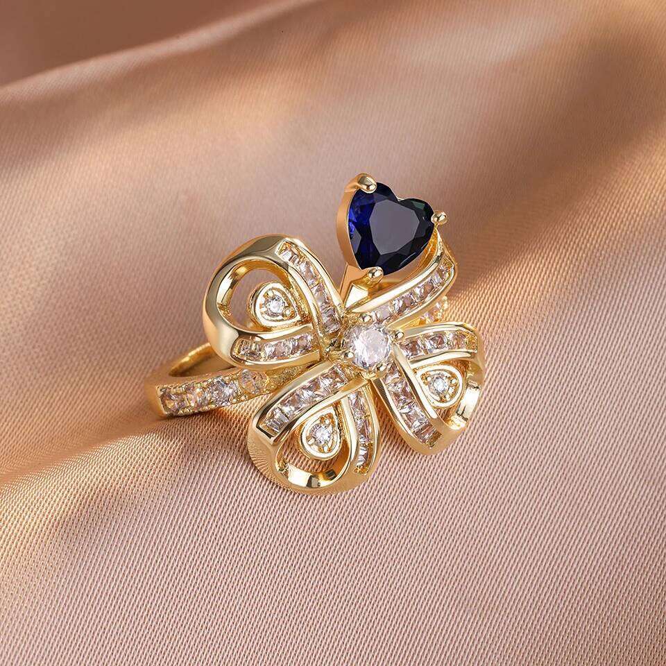 ZAKOL New Trendy Four-leaf Clover Flower Open Rings for Women Ladies Buling Dazzling Cubic Zirconia Engagement Ring Gift