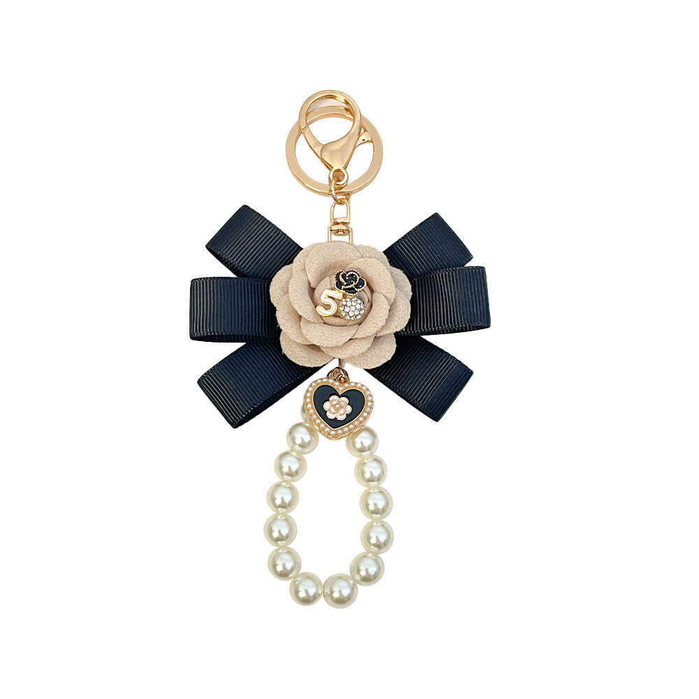 Women's Bag Pendant High-end Exquisite Fashion Creative Ribbon Pearl Keychain Small Gift key chain metal keyring belt