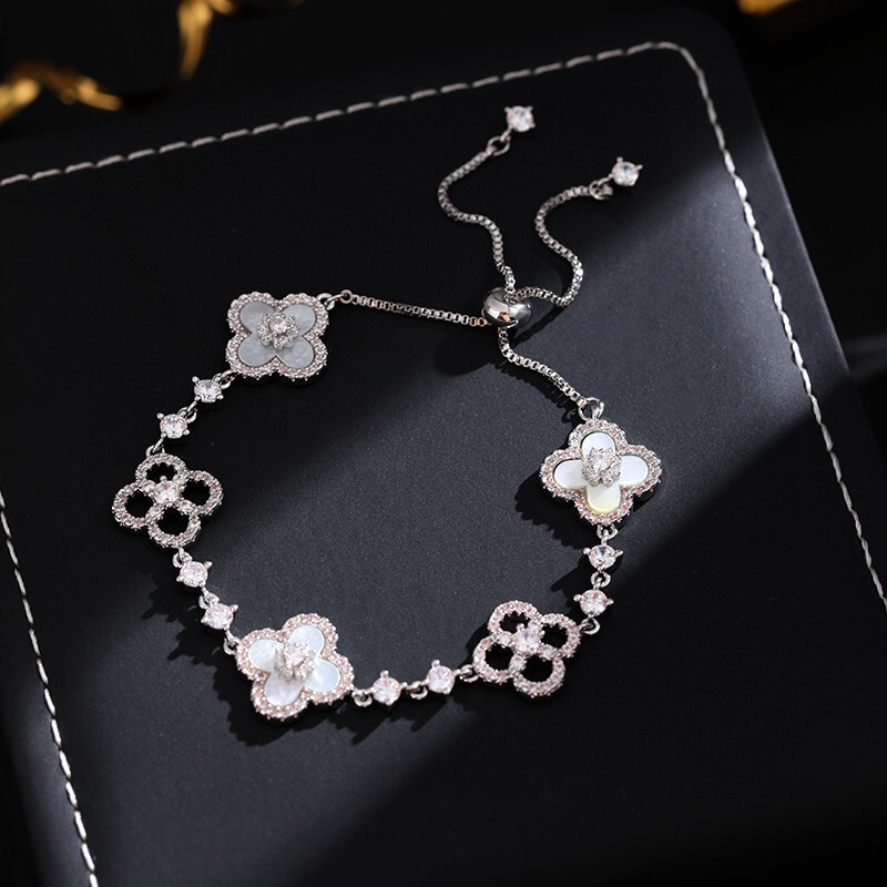 Luxury Brand Designer Jewelry Fashion Diamond-Studded Shiny Imitation Natural Pink Shell Hollow Lucky Four-Leaf Clover Pull Bracelet For Women Niche L