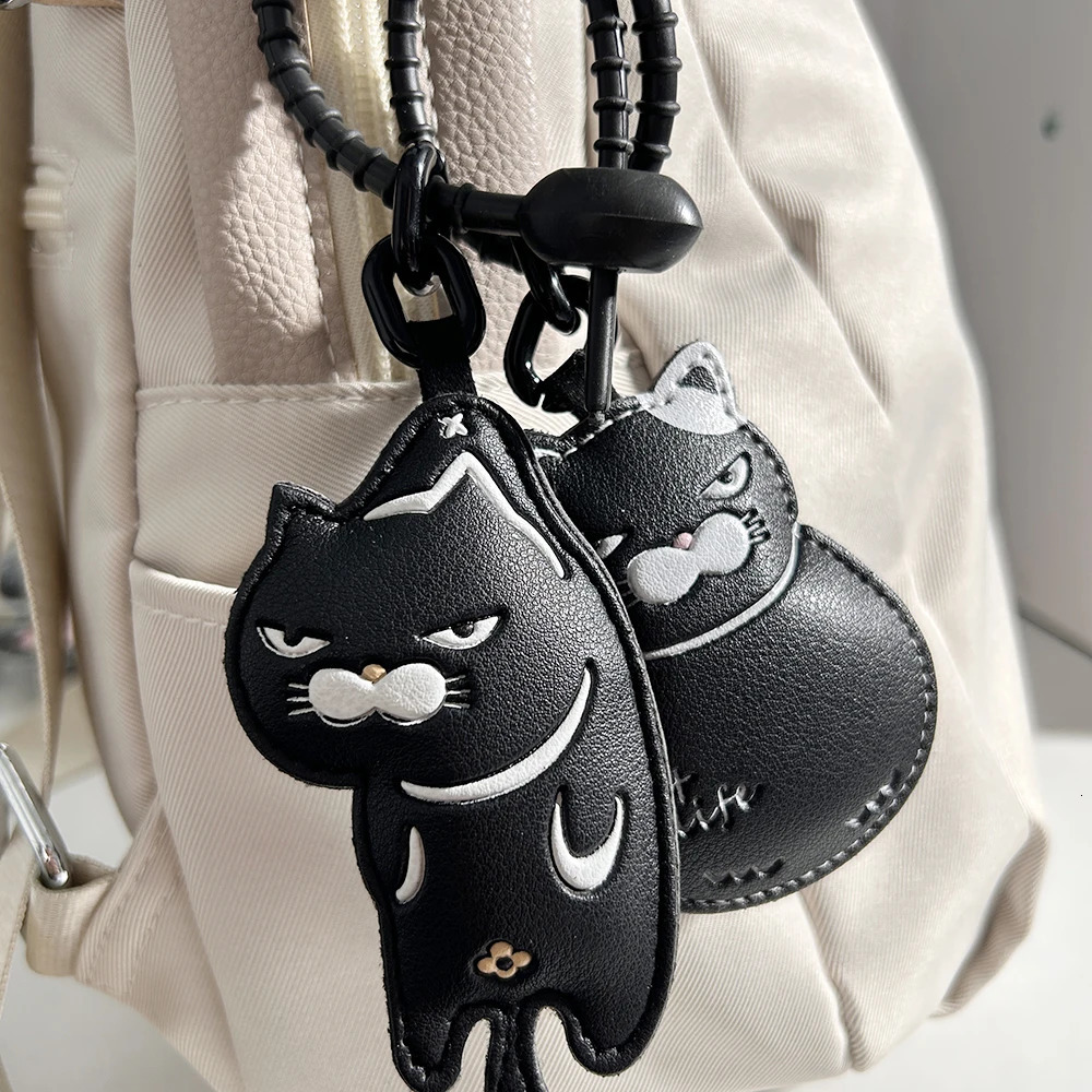 Cool Black Slacker Cat Leather Keychain Edgy Minimalist Couple Set Cute Bag Charm Unique Niche Gift for Lovers 251219
