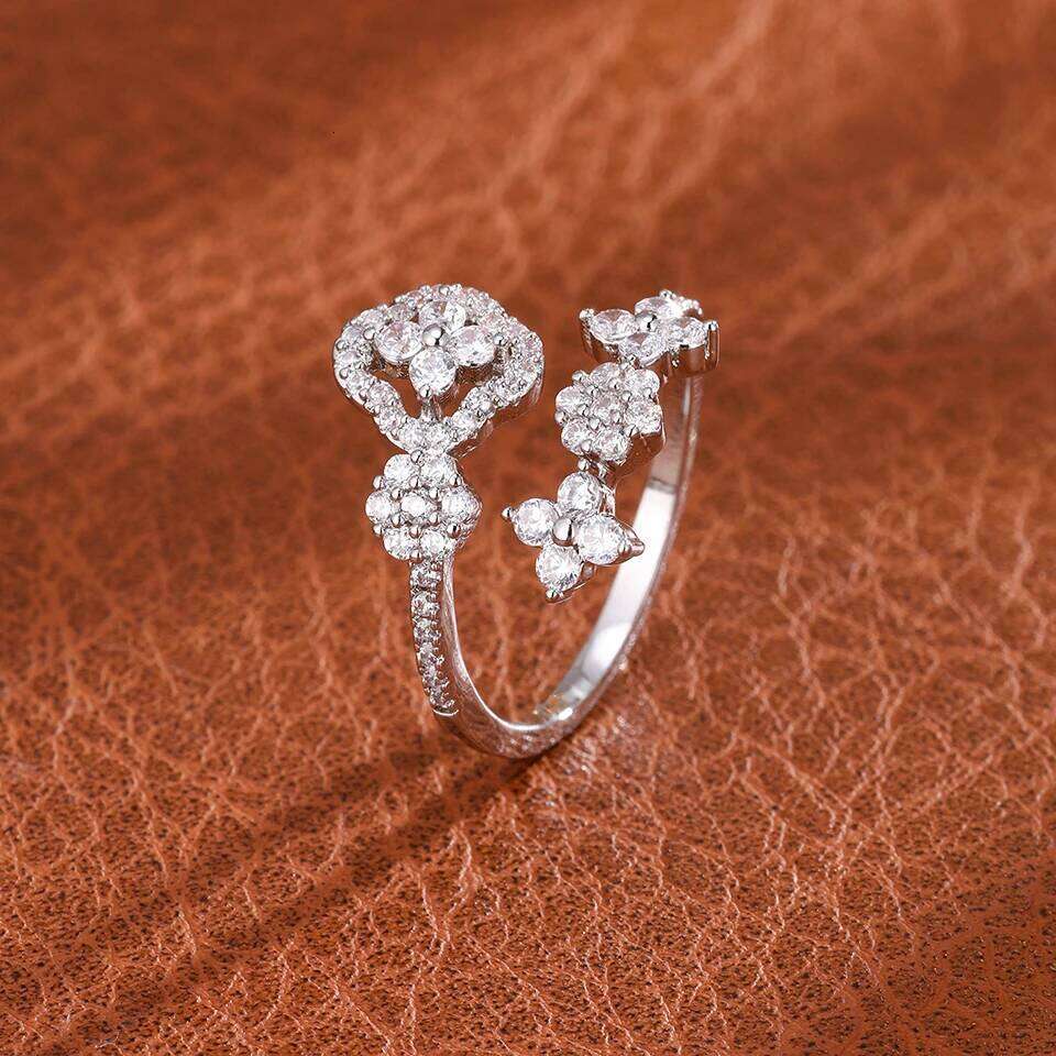 ZAKOL New Fashion Zircon Inlay Four-leaf Flower Design Open Ring For Women Exquisite Shiny CZ Niche Jewelry Gift