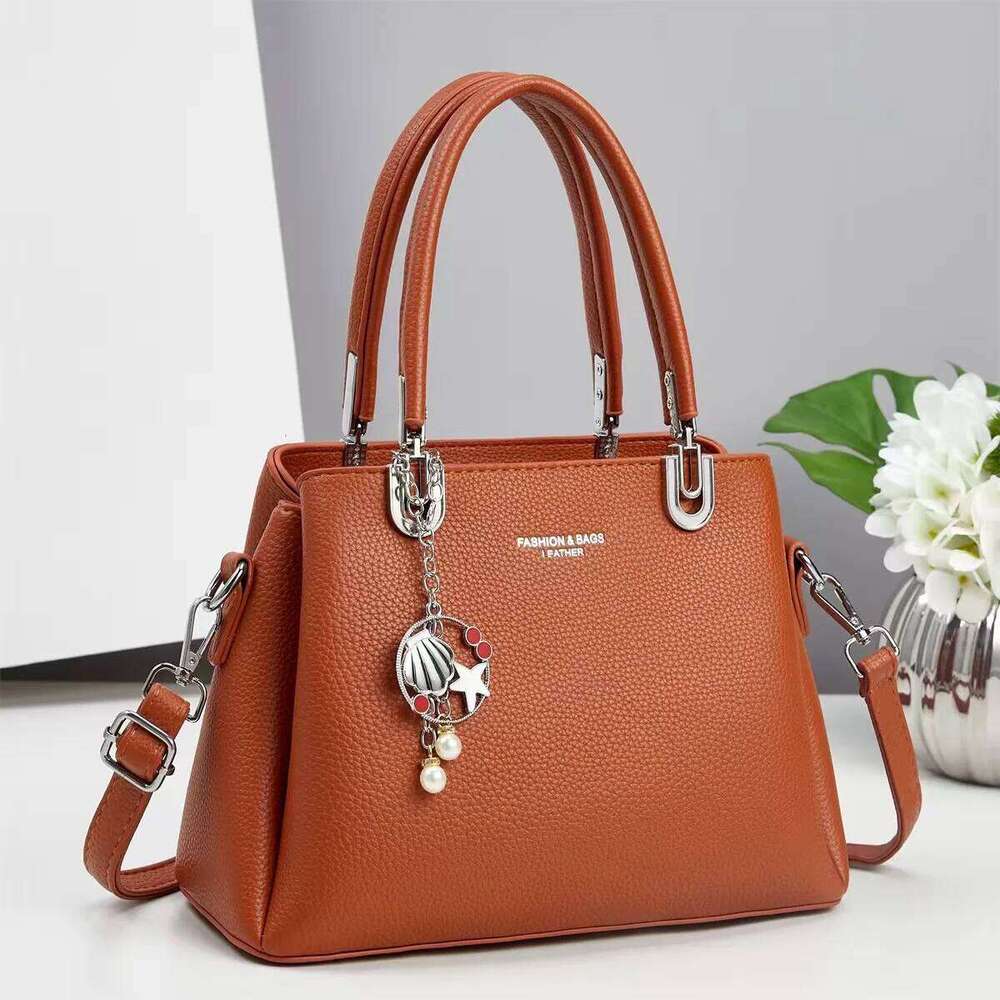 Fashionable Large Capacity Women's Handbag Street Trend PU Material Tote Bag Suitable For All Ages And Occasions Soft Structure shoulder bag Xiu 