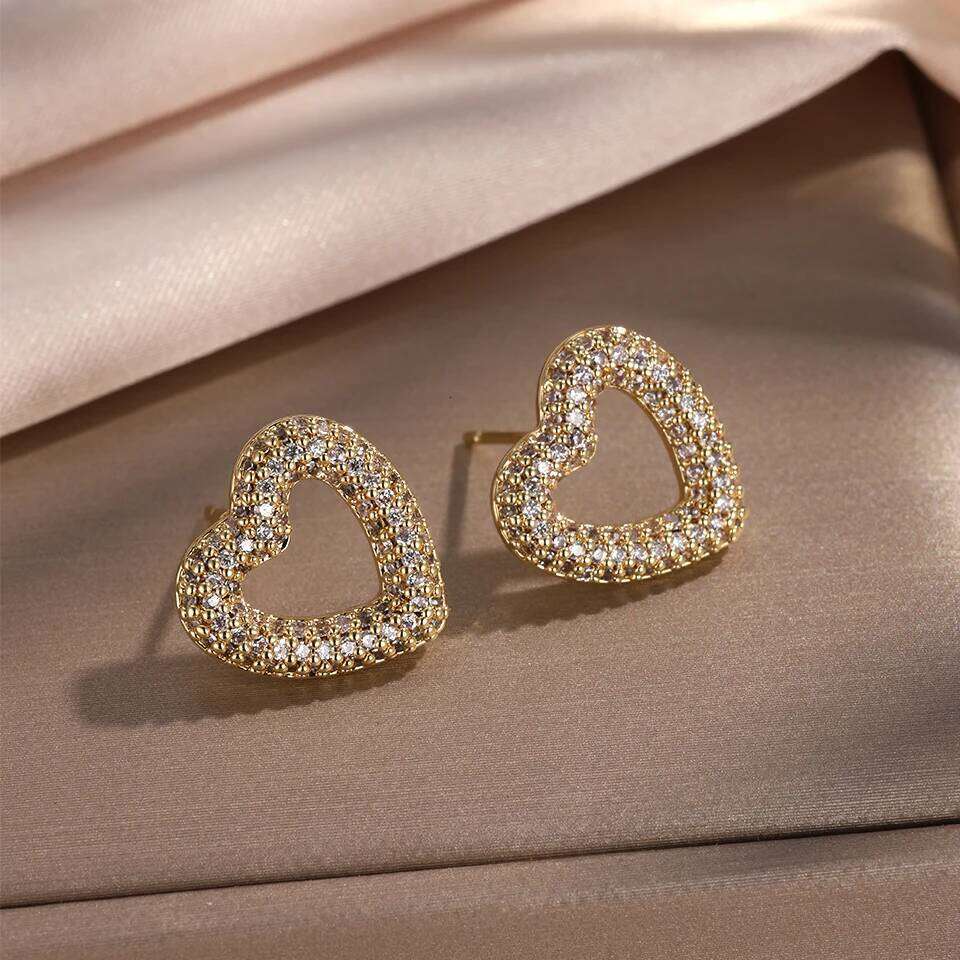 ZAKOL Gorgeous Micro-intact Zircon Hollow Heart Stud Earrings for Women Shining Niche Design Wedding Ear Accessories