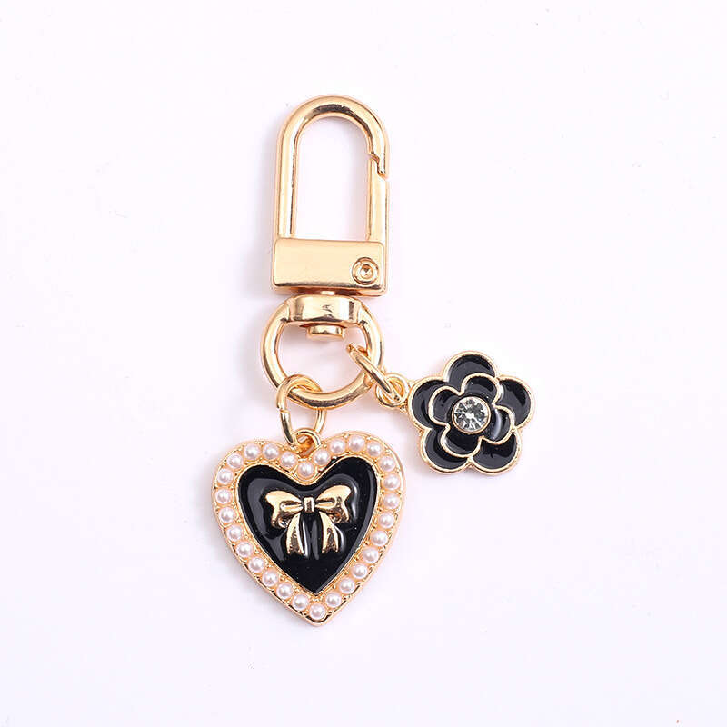 Pearl Bow Pendant Headphone Case Keychain Keychain Designer Accessory Chain Jewelry Accessories