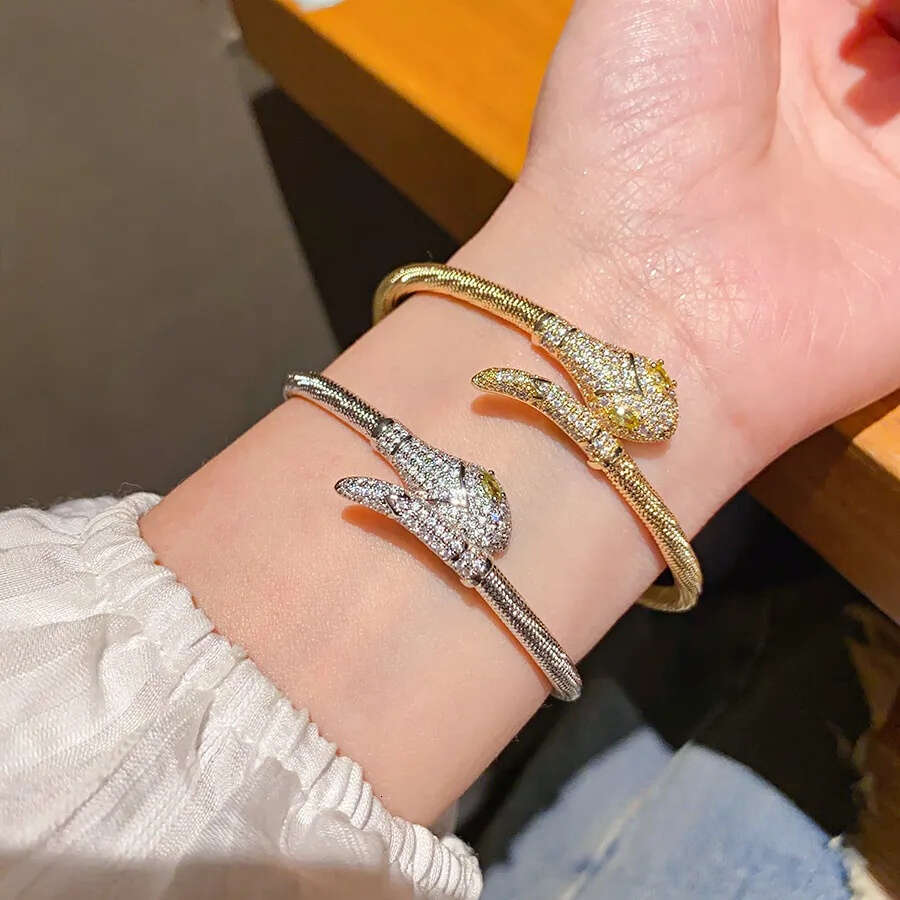 Bracelet Gold Plated Snake Design Bangle with Paved Cubic Zirconia and Yellow Crystal Eyes for Edgy Luxurious Party Gift High Quality Texture