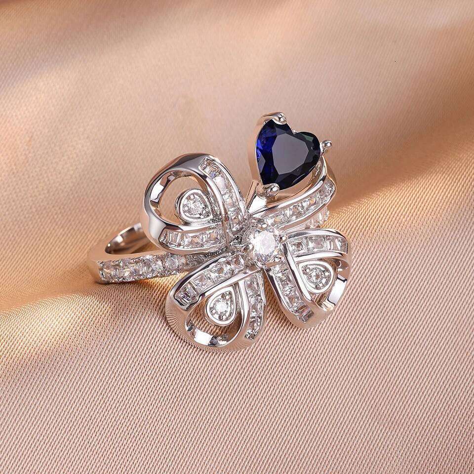 ZAKOL New Trendy Four-leaf Clover Flower Open Rings for Women Ladies Buling Dazzling Cubic Zirconia Engagement Ring Gift