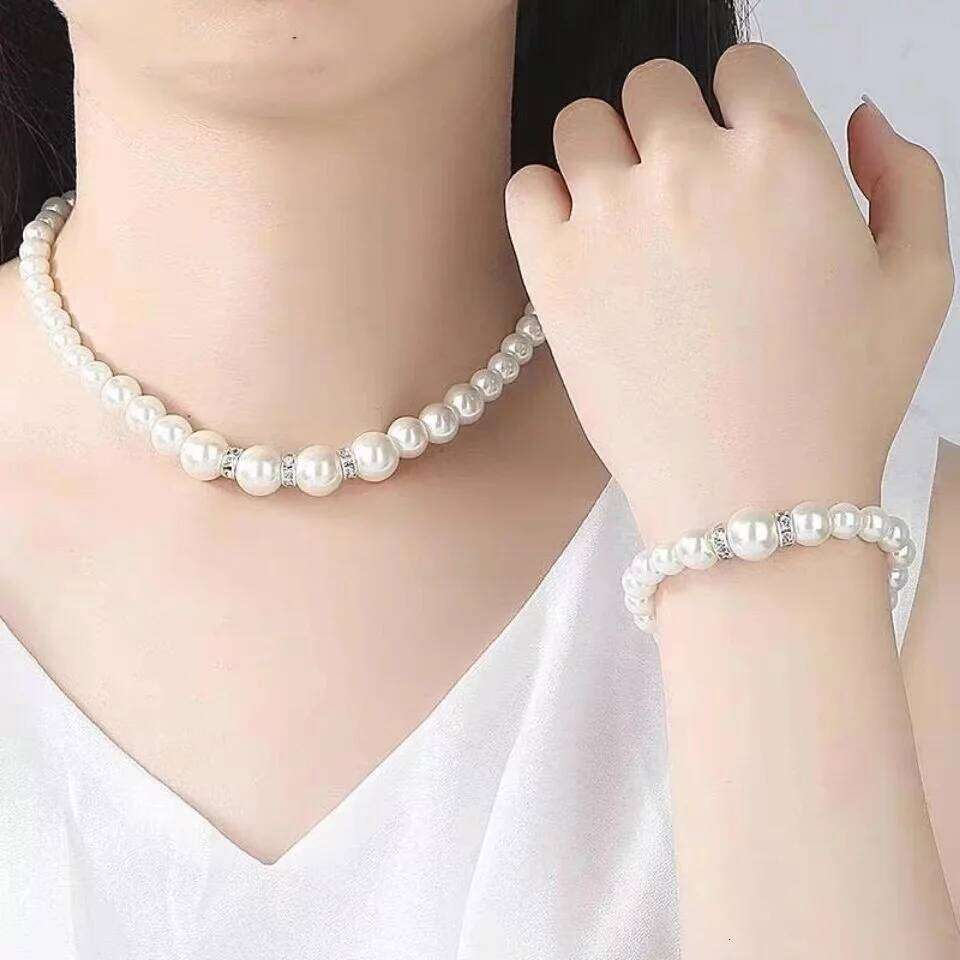 ZAKOL 4 Pcs Women's Pearl Fashion Simulated Pearls Versatile Earrings Necklaces Bracelets Jewelry Set Gift