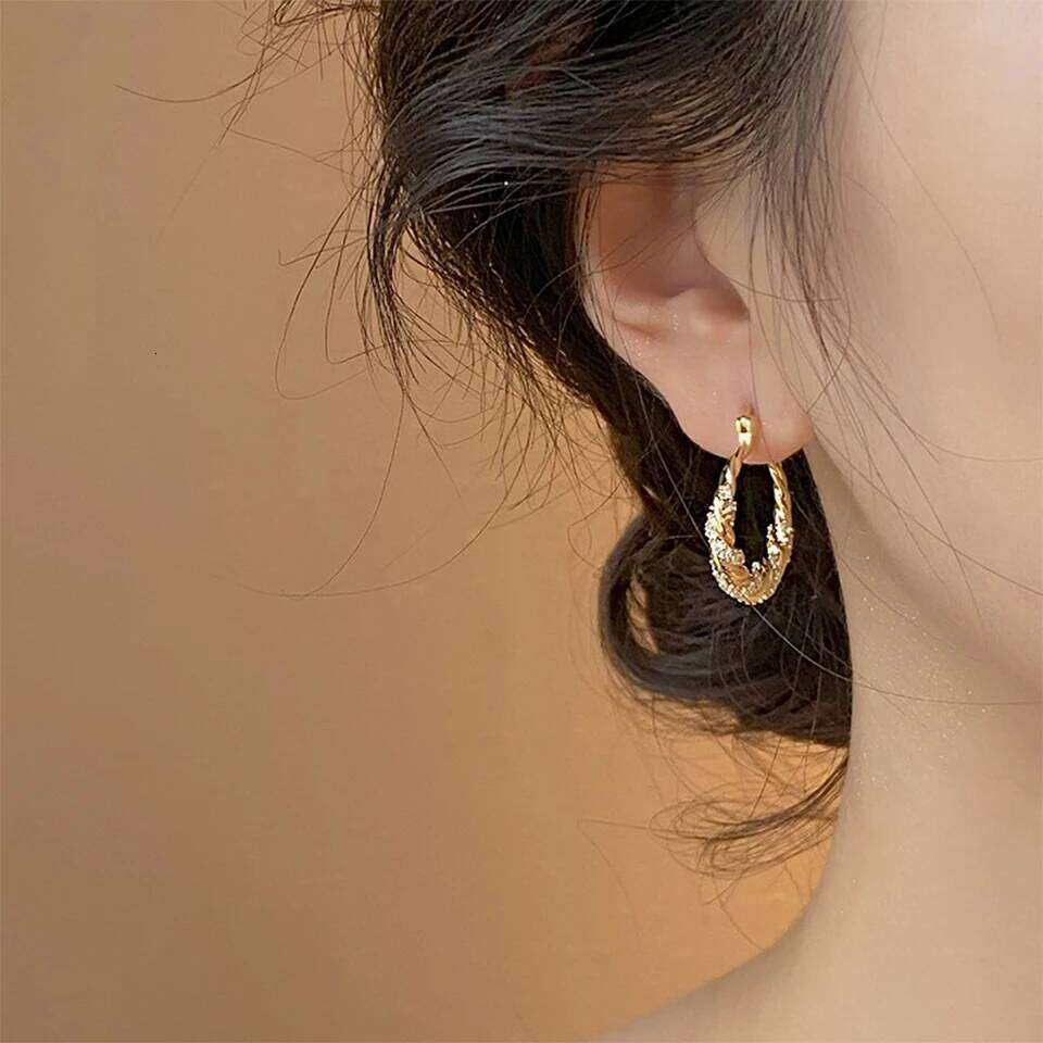 ZAKOL New Unique Shiny Zircon Winding Hoop Earrings for Women Fashion OL Style Gold Color Ear Accessories Party Jewelry