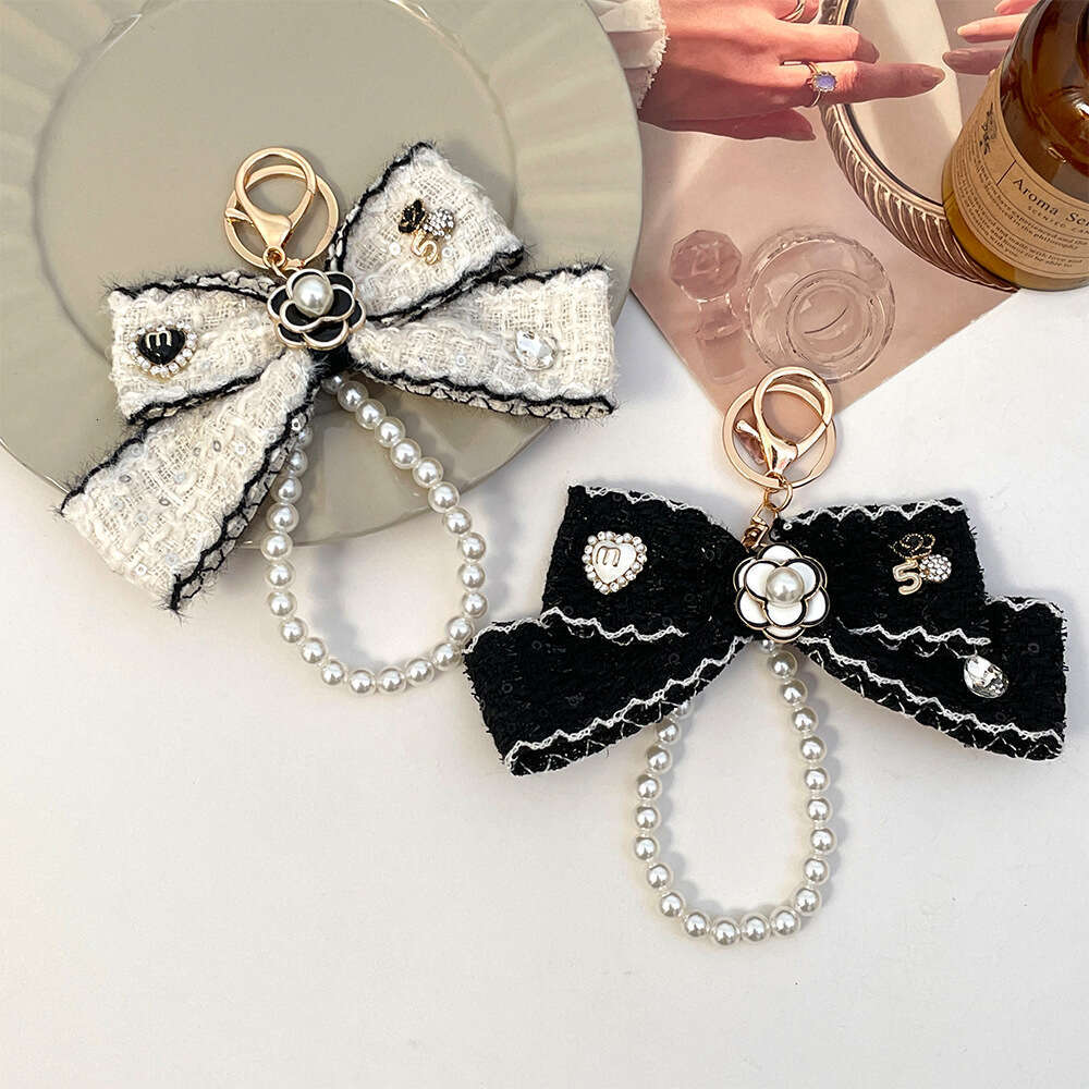 Camellia Pearl Chain Keychain Designer Bow Keyring Bag Decoration Pendant