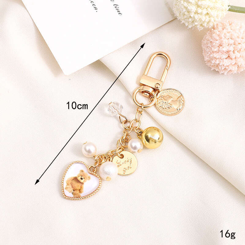 Pearl Bow Pendant Headphone Case Keychain Keychain Designer Accessory Chain Jewelry Accessories