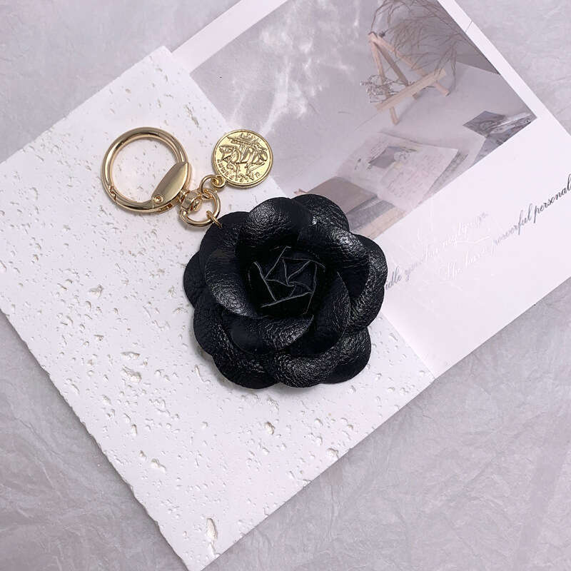 Fashionable Leather Camellia Backpack Pendant Keychain for Women Luxury Designer style