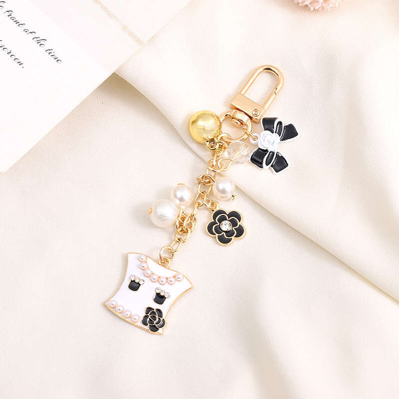 Pearl Bow Pendant Headphone Case Keychain Keychain Designer Accessory Chain Jewelry Accessories