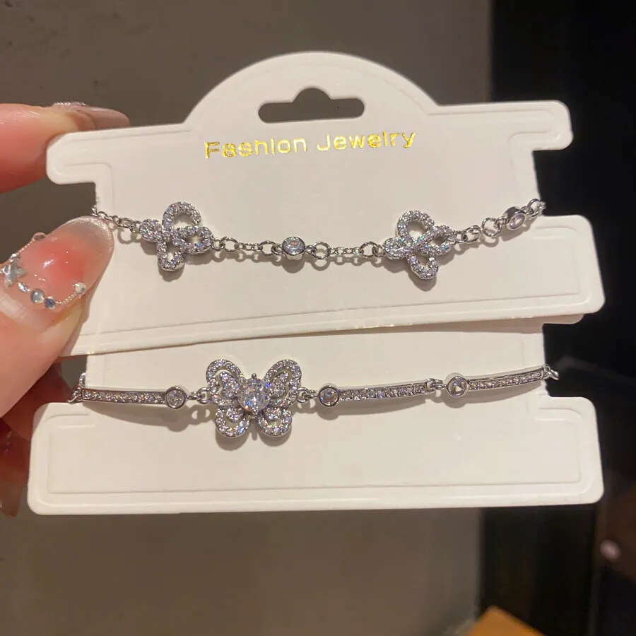 Designer Jewellery Silver Tone Butterfly Bracelet with Pave CZ Sparkle and Crystal Encrusted Chain for Daily and Special Occasion Gift Textured Elegan