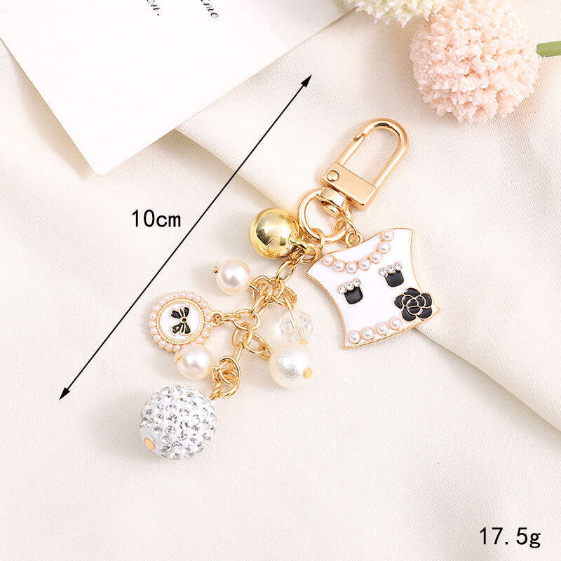 Pearl Bow Pendant Headphone Case Keychain Keychain Designer Accessory Chain Jewelry Accessories