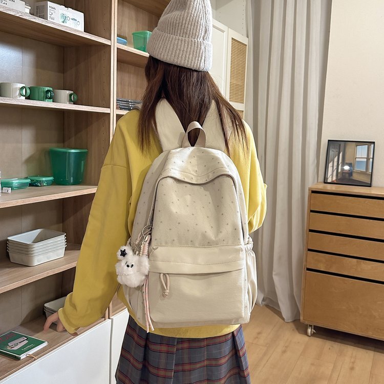 Freshly-touched-up, large-capacity backpack for students, suitable as a school bag