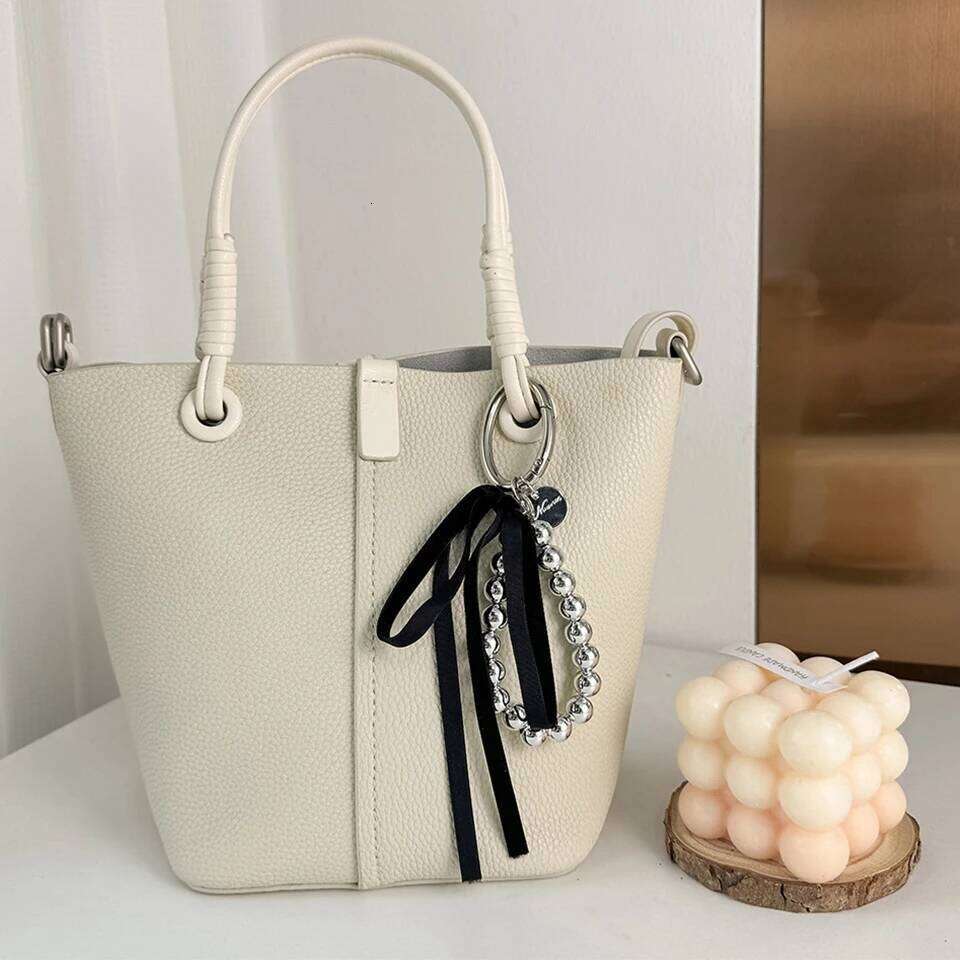 ZAKOL Elegant Pearls Ribbon Bowknot Bag Hanging Decoration Chain for Women Beads Key Rings Jewelry Girl Accessories