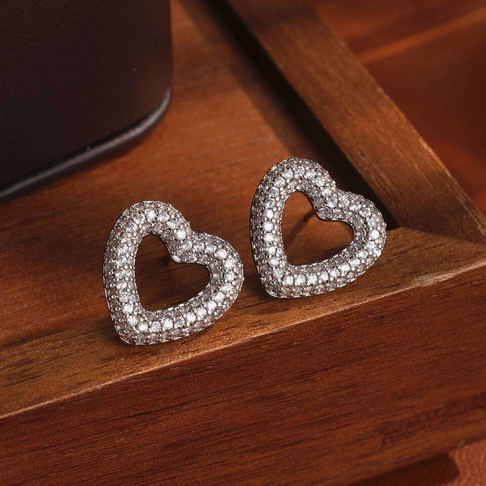 ZAKOL Gorgeous Micro-intact Zircon Hollow Heart Stud Earrings for Women Shining Niche Design Wedding Ear Accessories