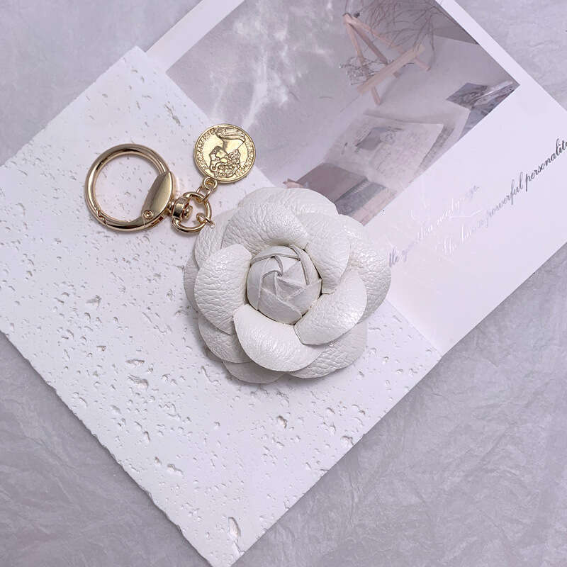 Fashionable Leather Camellia Backpack Pendant Keychain for Women Luxury Designer style