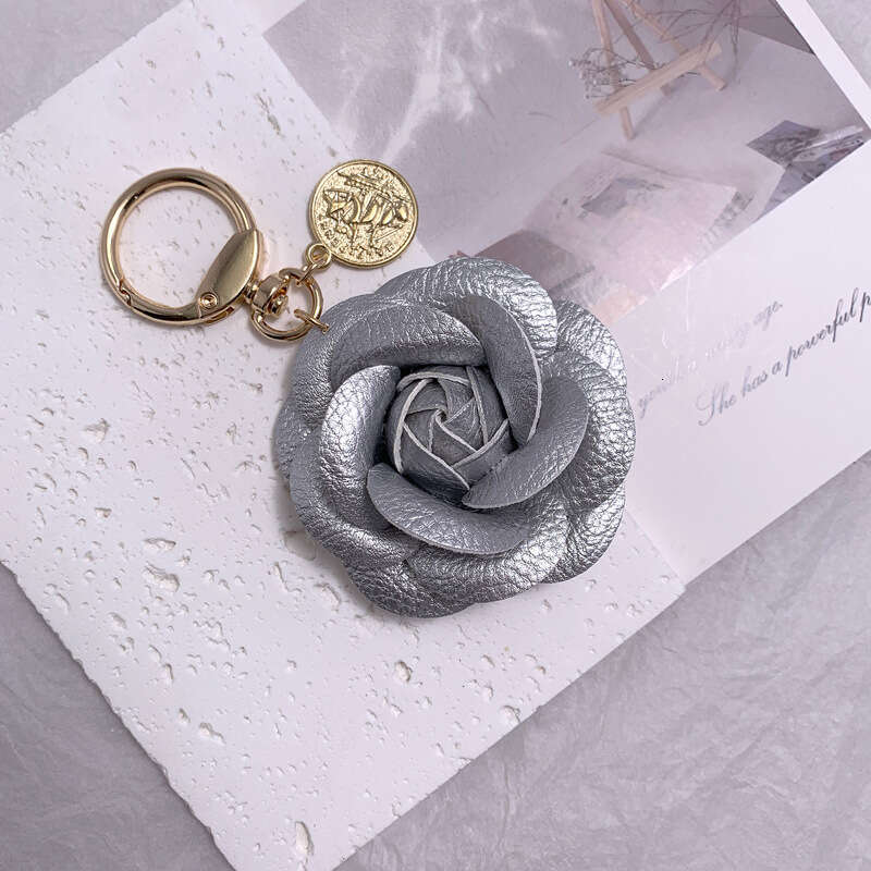 Fashionable Leather Camellia Backpack Pendant Keychain for Women Luxury Designer style
