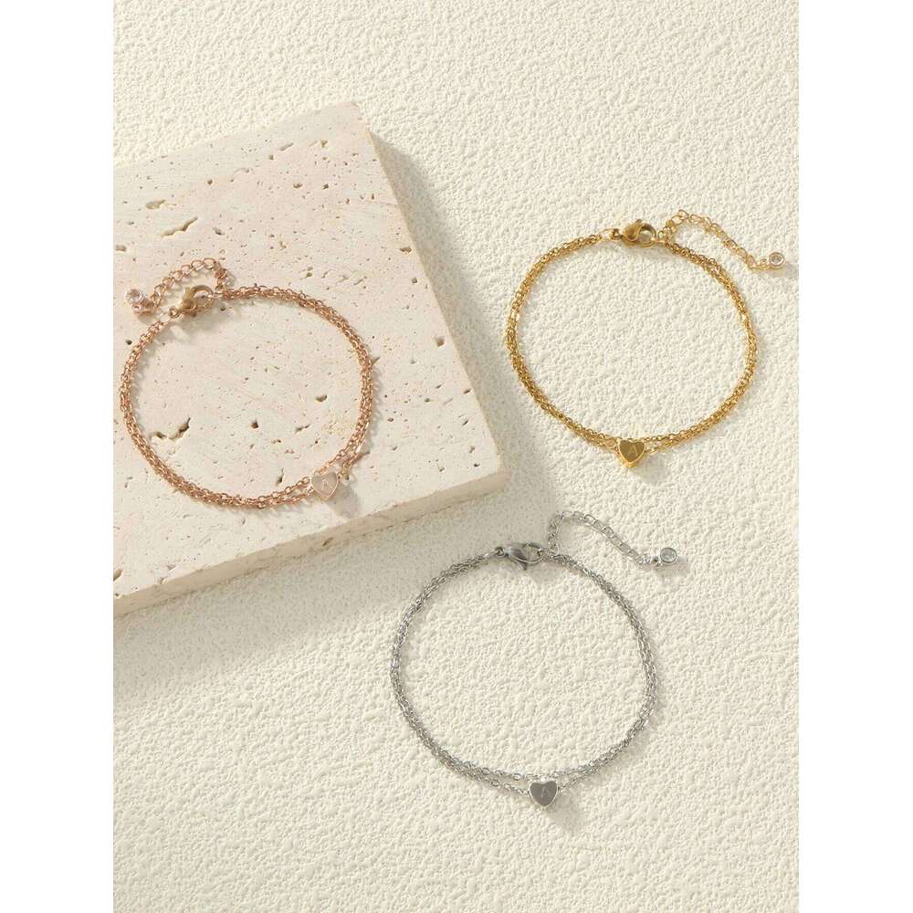 LNCHRAN Stainless steel plated 18K gold low allergy copper heart letter tail chain with zircon detail decorative bracelet 25H1229