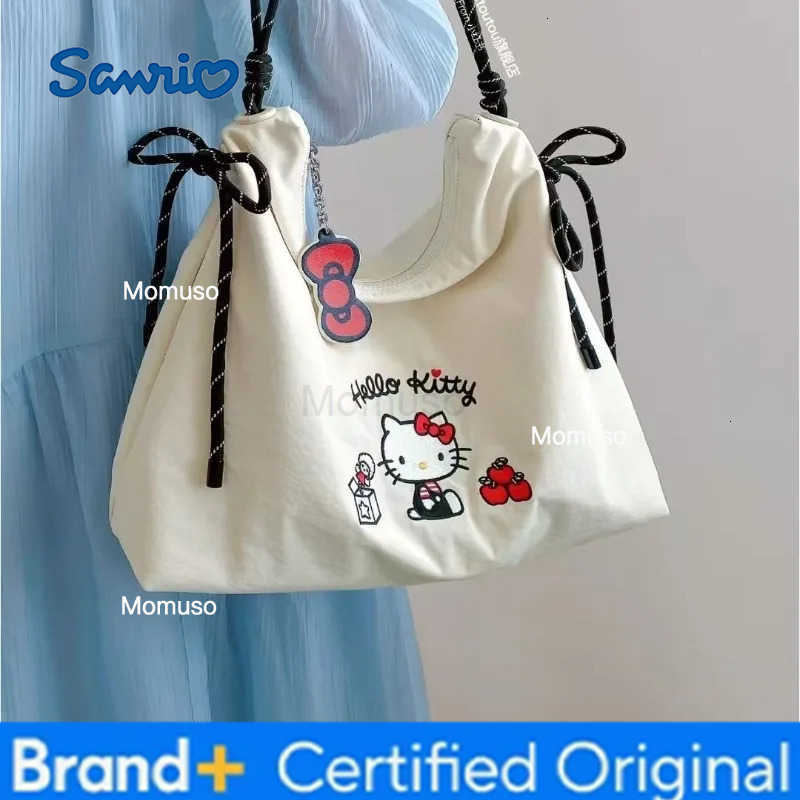 Sanrio Sanrios new Hello Kitty cartoon embroidered canvas crossbody bag for womens fashion large capacity portable outdoor tote bag H251230