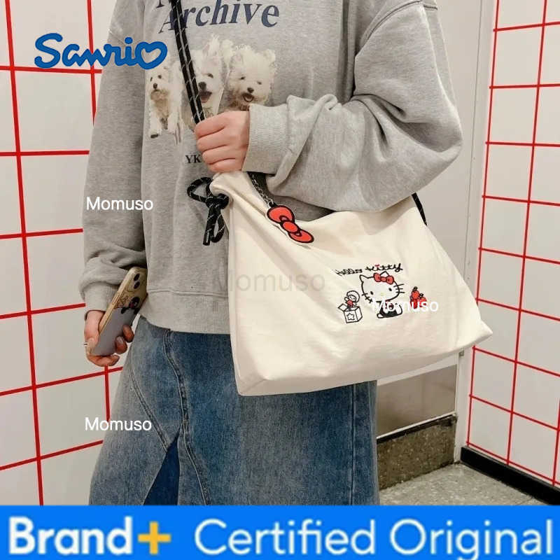 Sanrio Sanrios new Hello Kitty cartoon embroidered canvas crossbody bag for womens fashion large capacity portable outdoor tote bag H251230