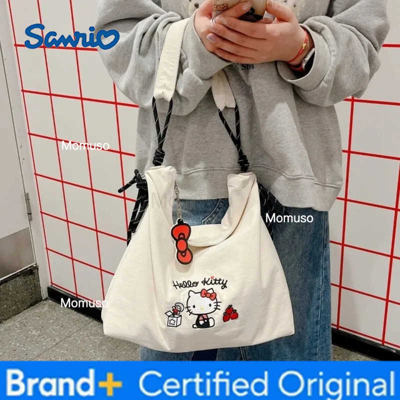 Sanrio Sanrios new Hello Kitty cartoon embroidered canvas crossbody bag for womens fashion large capacity portable outdoor tote bag H251230