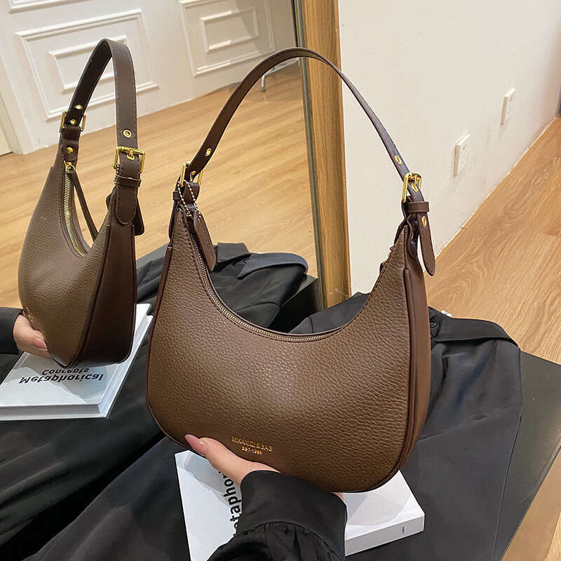 High-End French Baguette Underarm Women's Niche Design 2026 New Crescent Saddle Soft Leather Handbag Shoulder Bag for Women