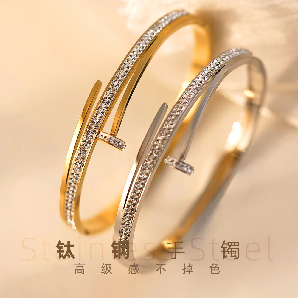 Luxury Brand Designer Jewelry Women's Wholesale Electroplated Gold Women's High-End Non-Fading Jewelry Nail With Rhinestone Steel Bracelet