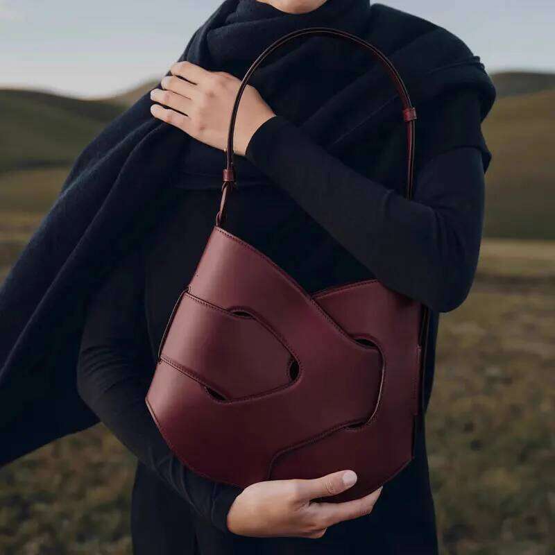 Angel Kiss French Niche New Woven Nodde Hobo Smooth Cowhide Twisted Handbag Crossbody Bag