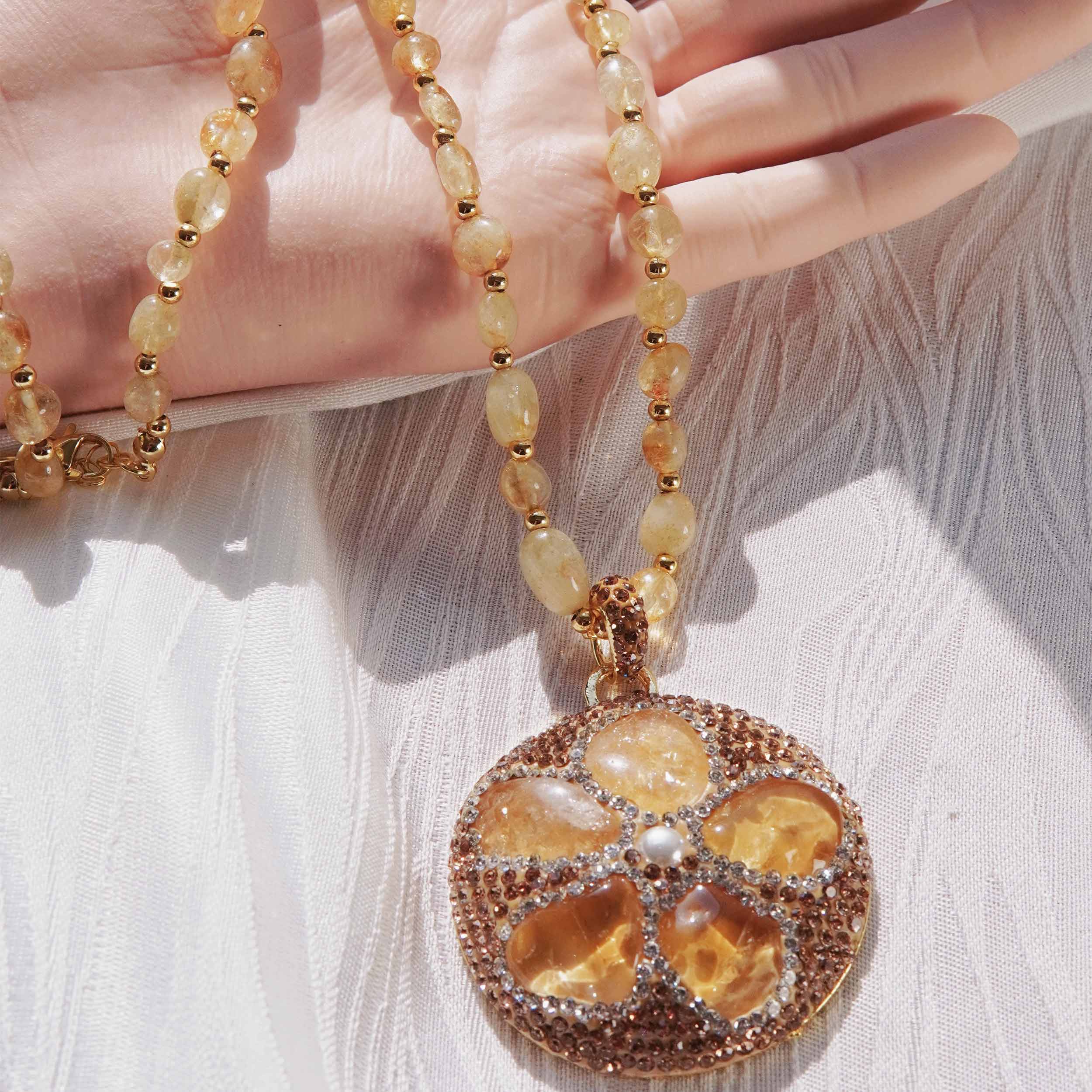 Kun Yuan is a light and luxurious natural citrine fresh water pearl shell ring earring necklace with sunflower citrine energy jewelry set.