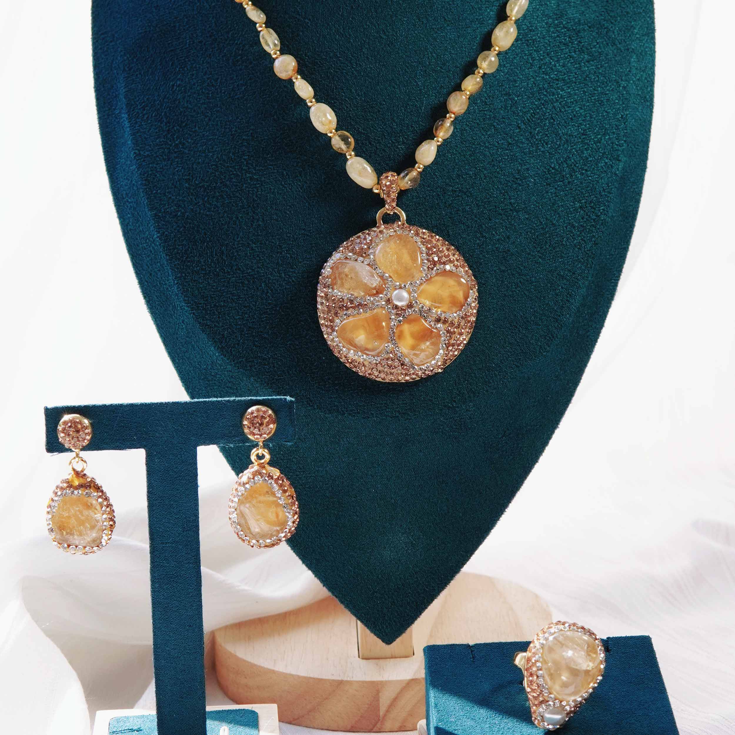 Kun Yuan is a light and luxurious natural citrine fresh water pearl shell ring earring necklace with sunflower citrine energy jewelry set.