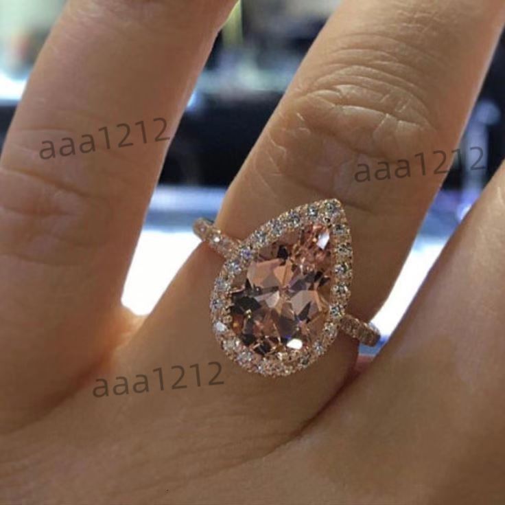 Customized Synthetic Gemstone Pear Cut 14k Rose Gold Morganite Ring