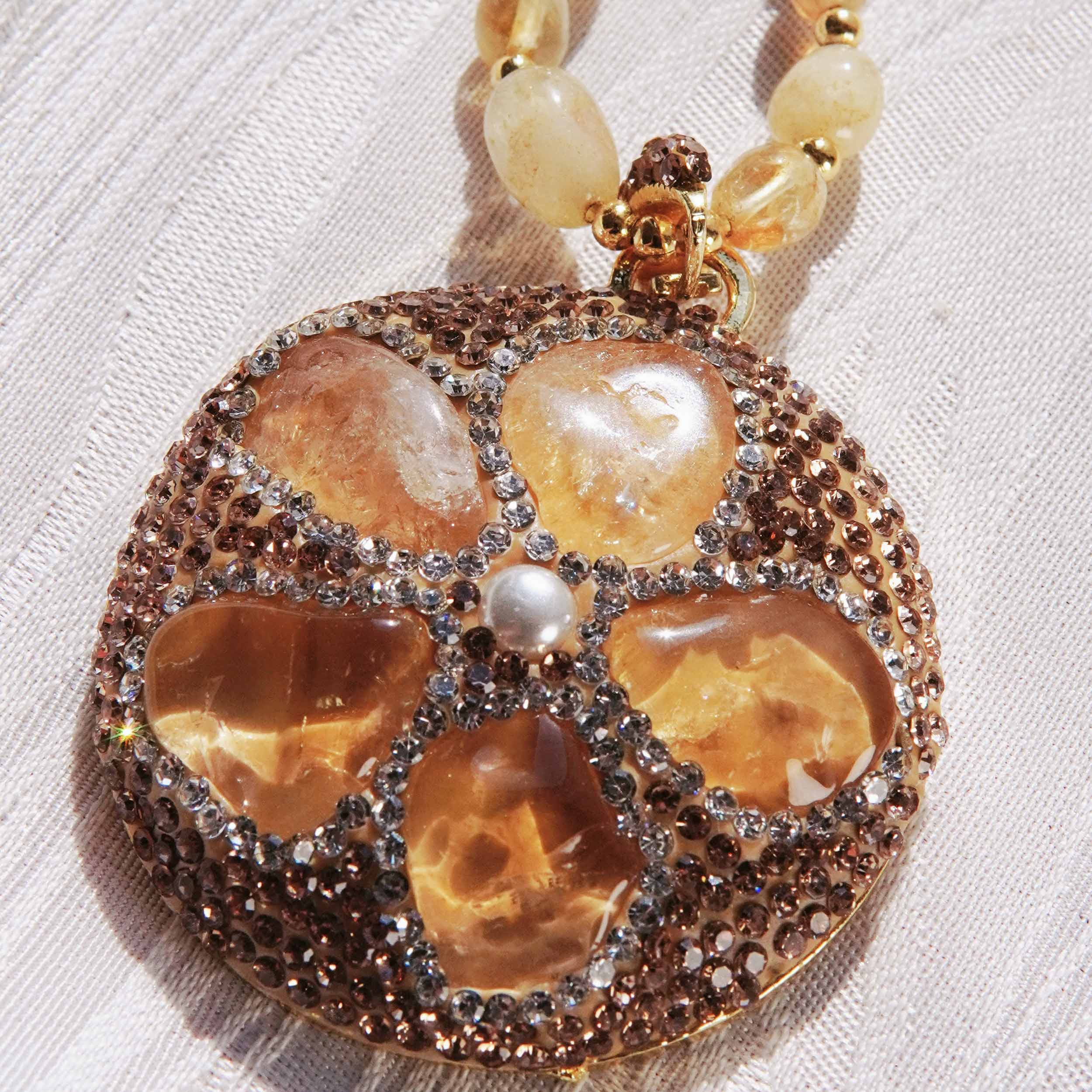 Kun Yuan is a light and luxurious natural citrine fresh water pearl shell ring earring necklace with sunflower citrine energy jewelry set.