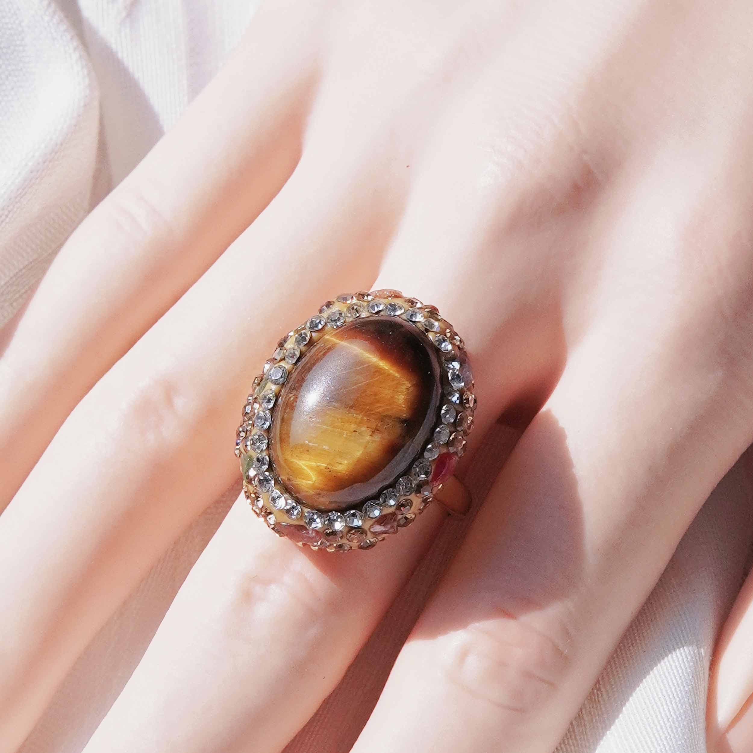 Kun Yuan is a natural tiger eye stone energy jewelry set light and luxurious natural tourmaline high fashion ring earrings necklace.