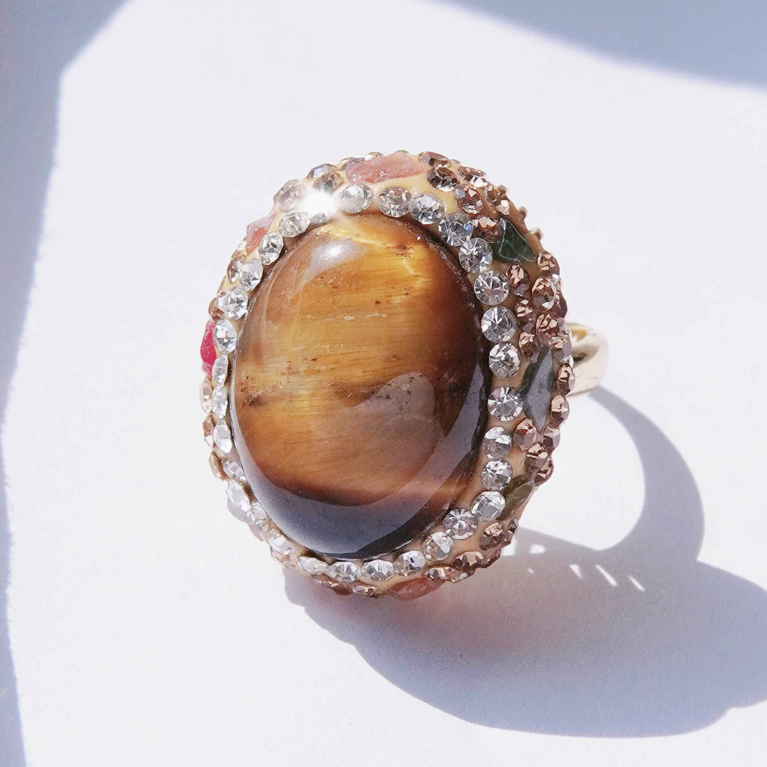 Kun Yuan is a natural tiger eye stone energy jewelry set light and luxurious natural tourmaline high fashion ring earrings necklace.