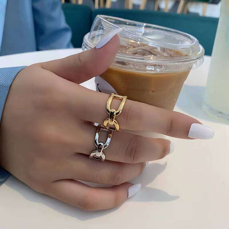 DHCollections Geometric Gold Stainless Steel Ring - Adjustable Open Cuff Minimalist Finger Ring for Women & Men (Trendy 2025 Spring Collection)