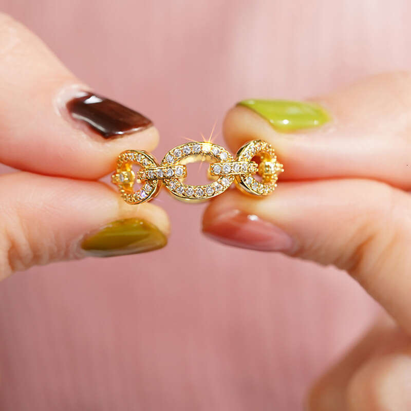 DHCollections Geometric Micro-Pave Ring - 18K Gold/Rhodium Plated Circular Statement Ring with Zircon Stones (US Size 6-10)