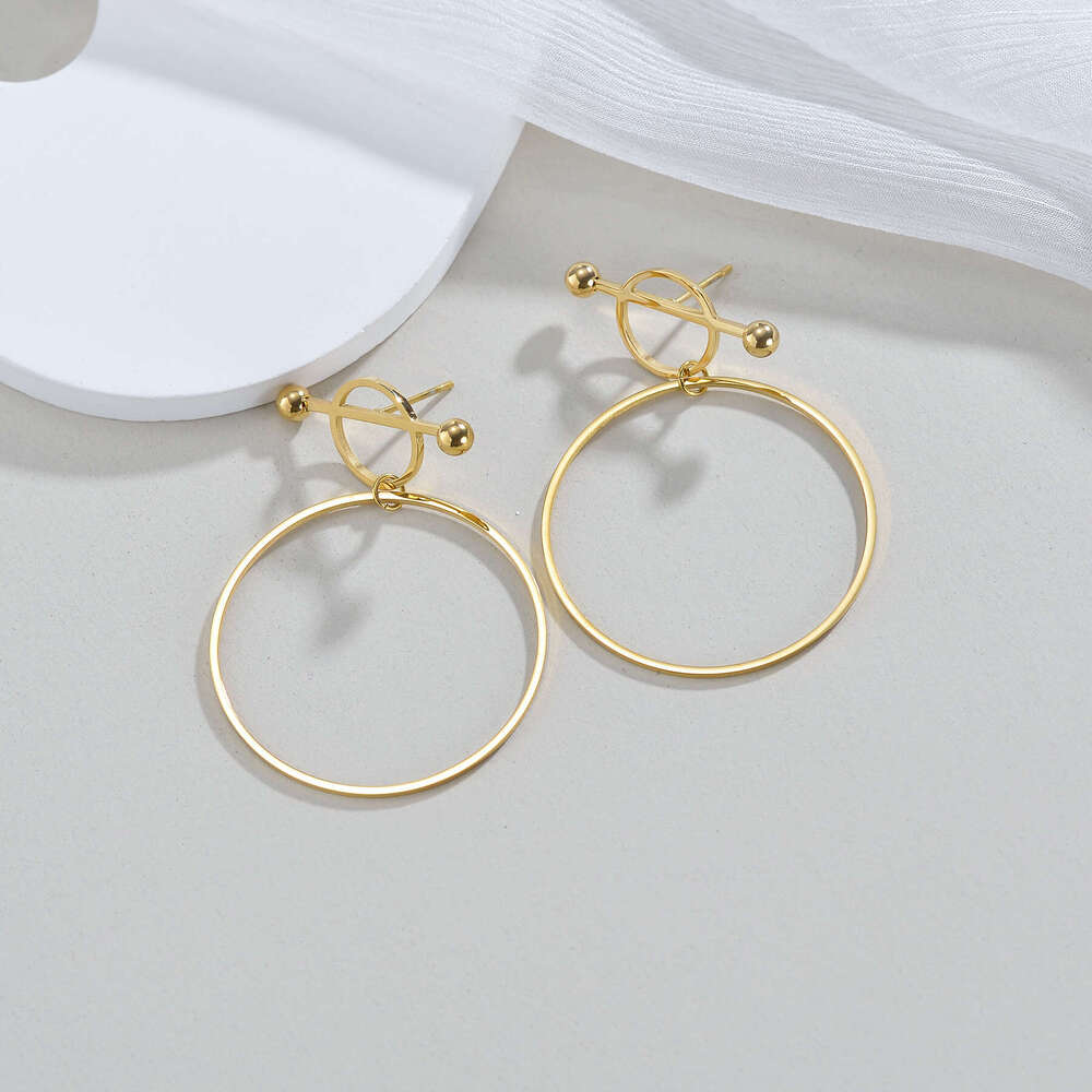 DHcollections New Gold-Plated Stainless Fashion INS Style Hollow Circle Hoop Earrings Titanium Steel Jewelry