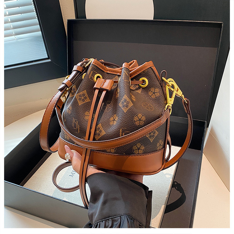 Free shipping designer High-End Fashion Lucky Bag Drawstring Bucket Bag Women Bag 2025 New Retro Print Shoulder Bag Women Crossbody Bag
