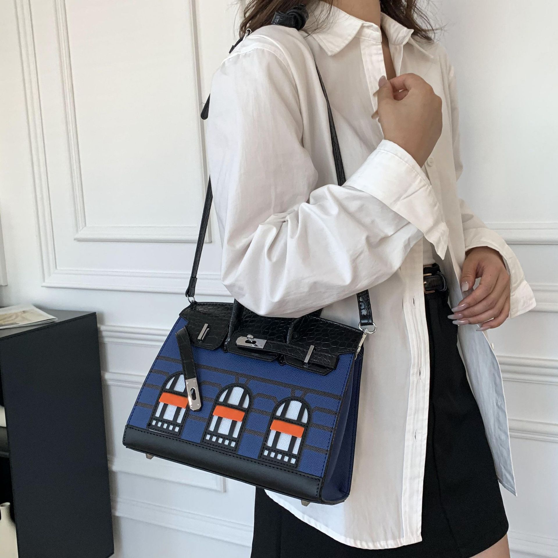 2025 Free Shipping Designer Luxury Women Fashionable color blocked small house bag versatile hand held crossbody bag for women