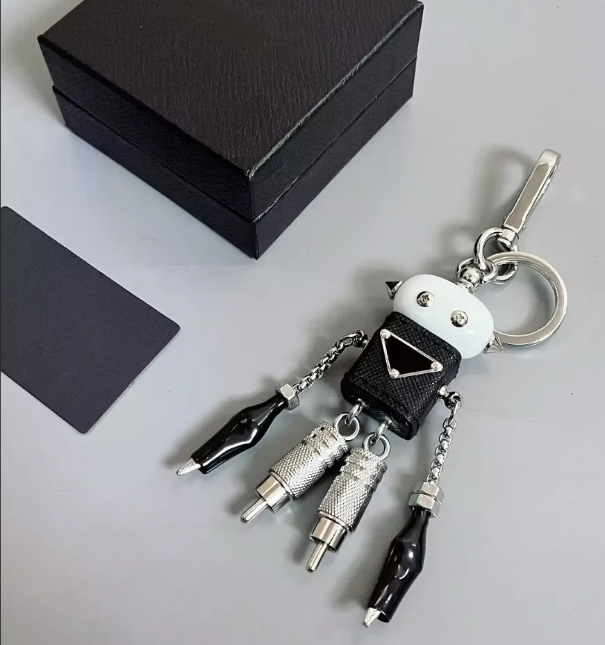 Keychains Lanyards designer Robot Saffiano leather bag charm keychain triangle Personalized metal robot pendant handbag charm for women men Accessories Key Chain