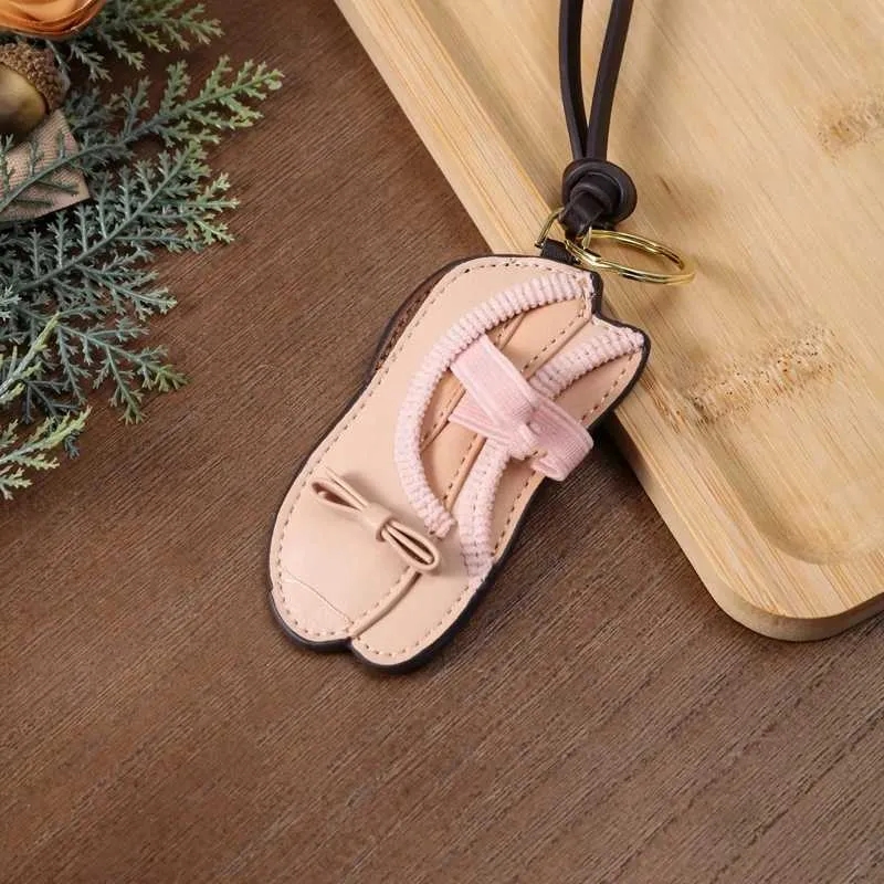 Keychains Lanyards M New Brand Mini Ballet Shoe Bag Charm Genuine Leather Blue Shirt Cardigan Skirt Niche Design Bag Pendant Personty Shoe Charm L2509