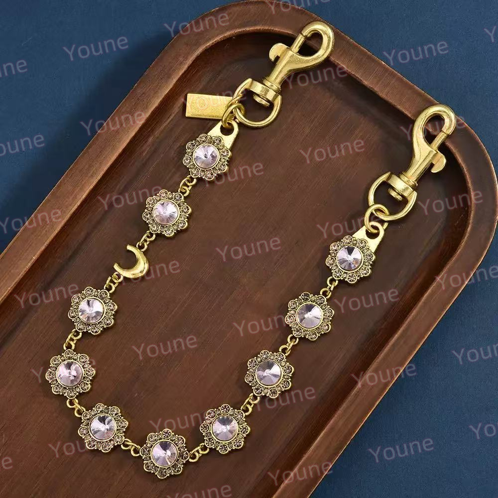 s designer lanyards Co ch Elliptical carved water dia buckle keychain for men women key chain charm bag keyring fashion Bag Parts Accessories