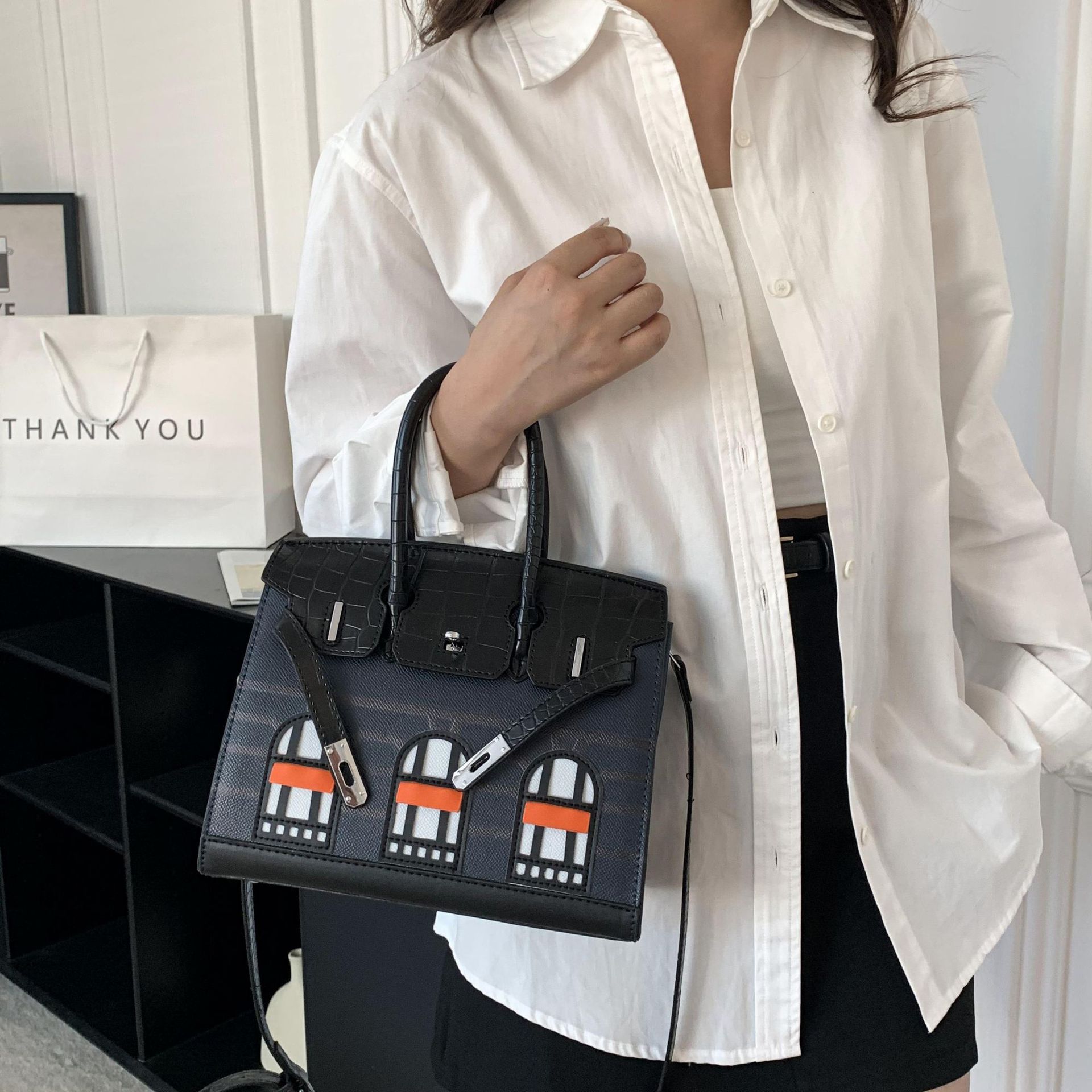 2025 Free Shipping Designer Luxury Women Fashionable color blocked small house bag versatile hand held crossbody bag for women