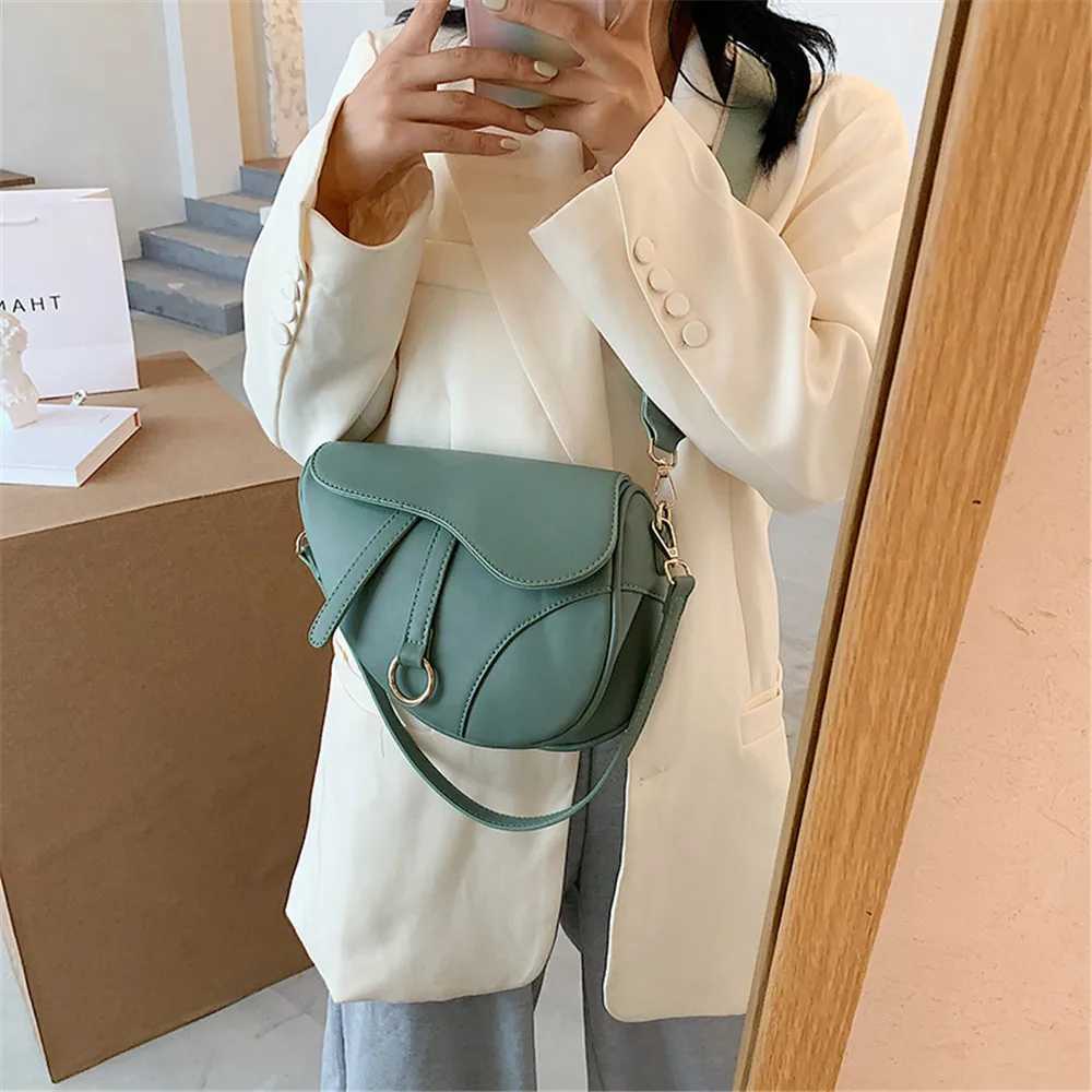 2022 New Womens Bag Leisure Saddle Bag Pu Solid Color Diagonal Bag Fashion Easy Matching Lady Handbags Z250702